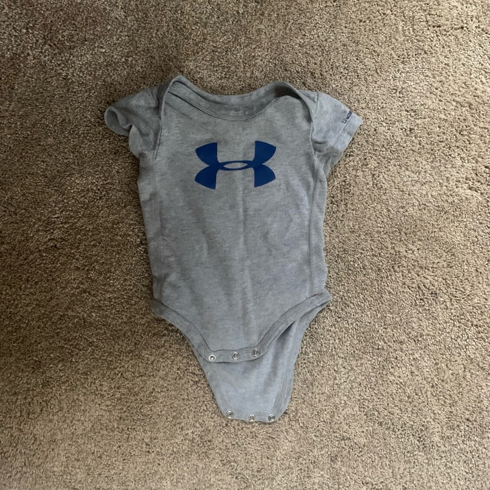 6-9 month under armour onesie. Good condition